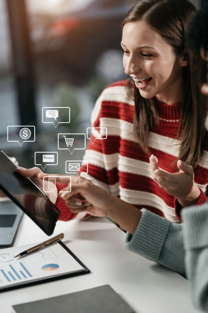 businesswomen using tablet with laptop document desk modern office with virtual interface graphic icons network diagram(1)